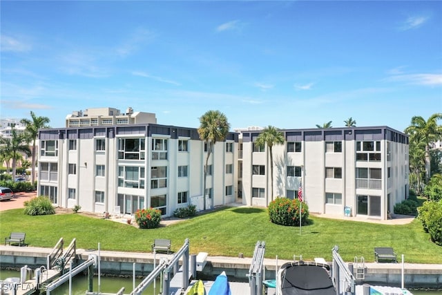 view of building exterior with a water view