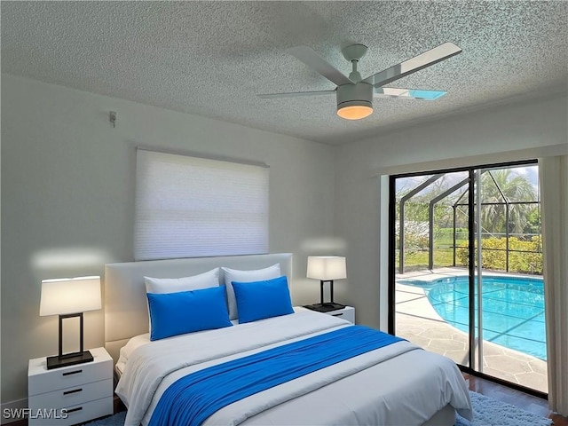 bedroom with hardwood / wood-style flooring, ceiling fan, a textured ceiling, and access to outside