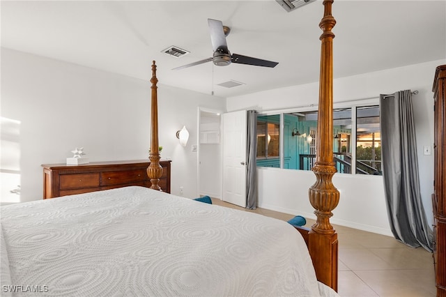 tiled bedroom with ceiling fan