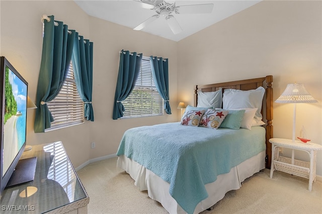 bedroom with ceiling fan and light colored carpet