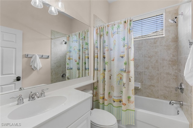 full bathroom featuring shower / tub combo with curtain, vanity, and toilet