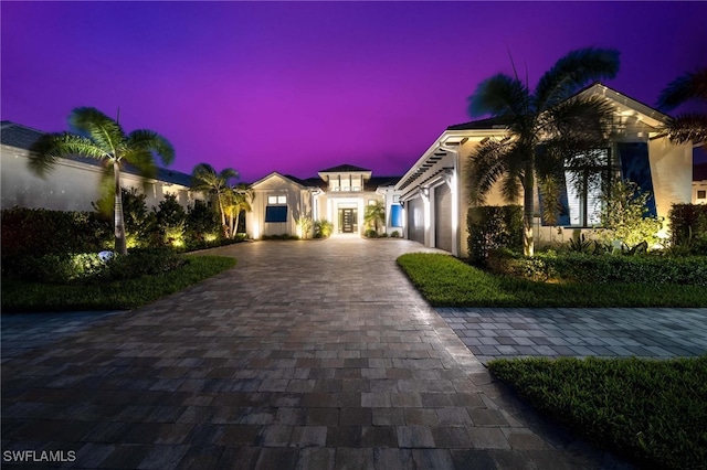 mediterranean / spanish-style house featuring a garage