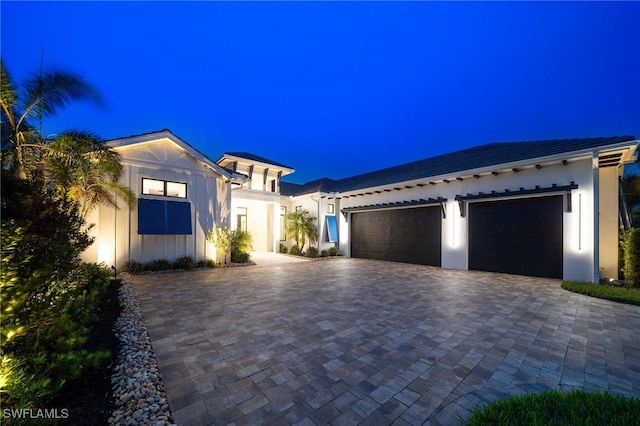 view of front of property with a garage