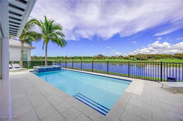 view of swimming pool featuring an in ground hot tub, a patio, and a water view