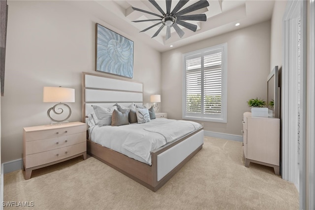 carpeted bedroom with ceiling fan