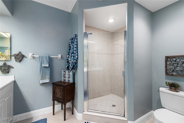 bathroom with tile patterned floors, toilet, a shower with shower door, ornamental molding, and vanity