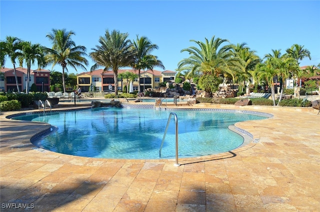 view of pool featuring a patio area