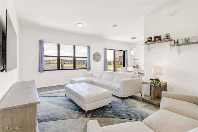 living room with light hardwood / wood-style floors