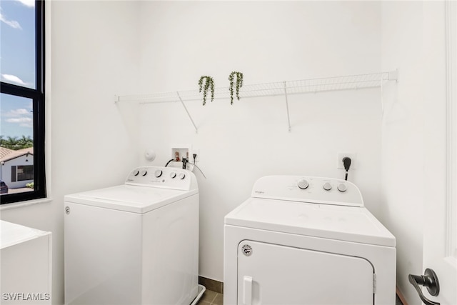 laundry room featuring washing machine and dryer