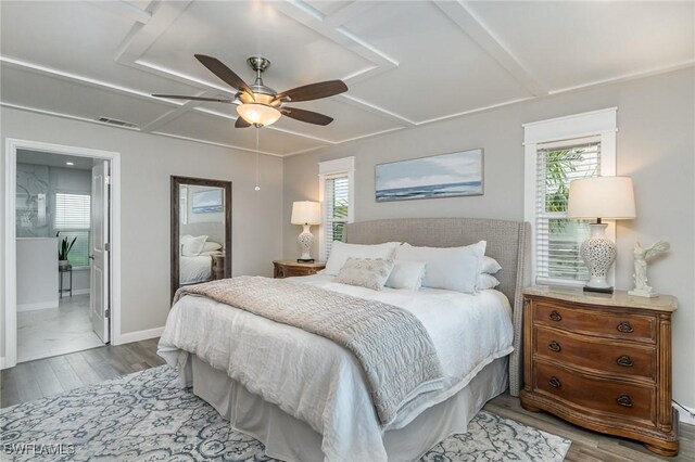 bedroom with wood-type flooring and ceiling fan