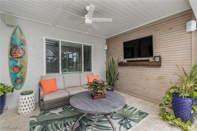 view of patio featuring ceiling fan