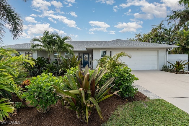 view of front of home with a garage