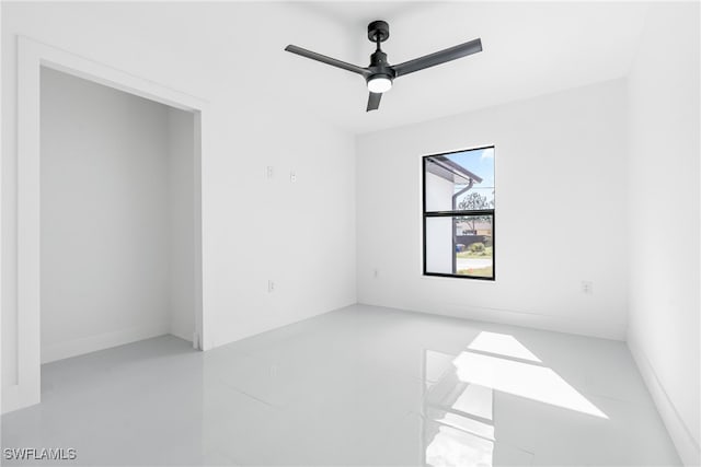 empty room featuring ceiling fan