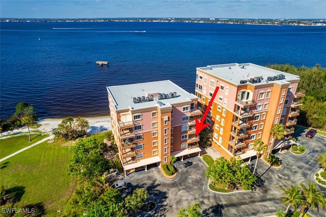 drone / aerial view with a water view