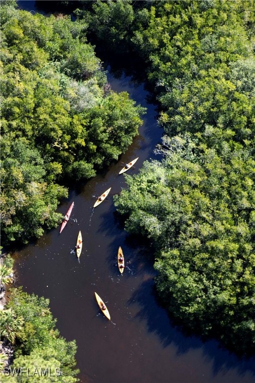 drone / aerial view featuring a water view