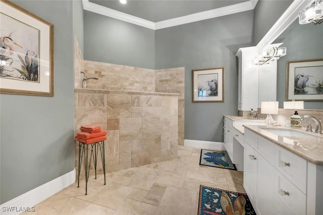 bathroom with vanity, ornamental molding, and a shower