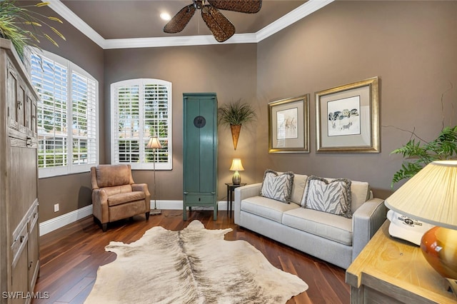 living room featuring ornamental molding, dark hardwood / wood-style floors, and ceiling fan