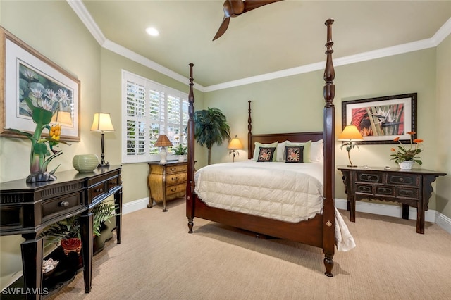 bedroom featuring crown molding, light carpet, and ceiling fan