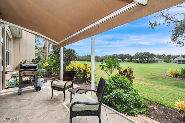 view of patio with a grill