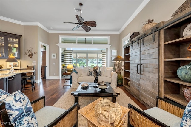 living room featuring ornamental molding, ceiling fan, and dark hardwood / wood-style flooring