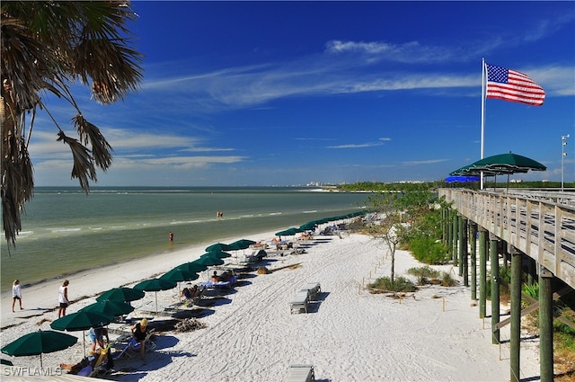 property view of water featuring a beach view