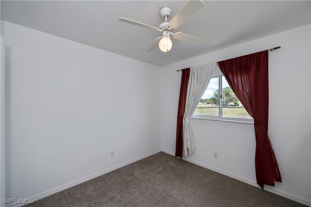 unfurnished room with carpet and ceiling fan