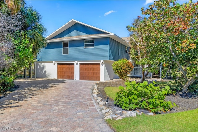 view of front of home featuring a garage