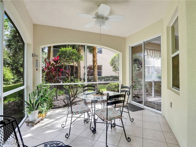 sunroom / solarium with ceiling fan