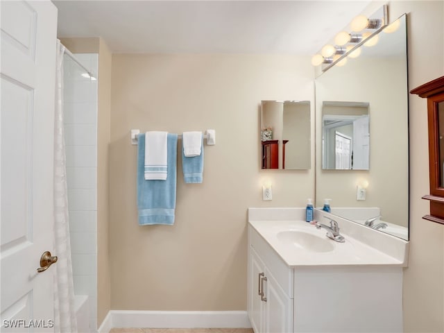 bathroom with vanity and shower / tub combo