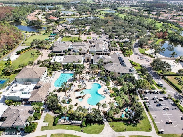 birds eye view of property featuring a water view