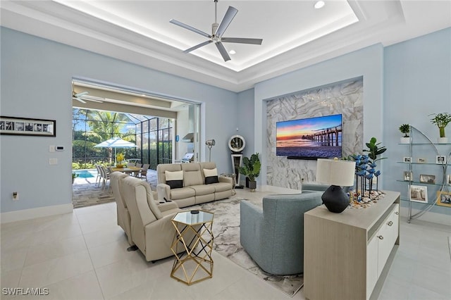 tiled living room with a raised ceiling