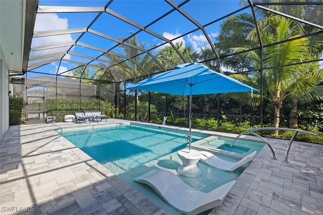 view of swimming pool with glass enclosure, a patio, and a hot tub