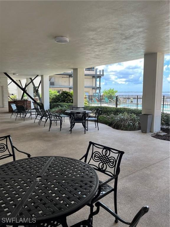 2350 W 1st St Unit 205, Fort Myers, FL 33901 - view of patio with outdoor dining area