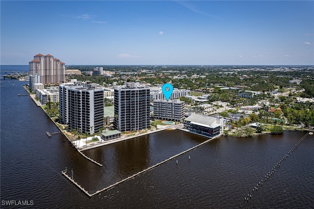 birds eye view of property featuring a water view