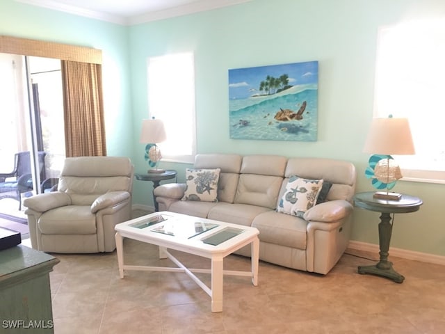 living room featuring ornamental molding, light tile patterned flooring, and plenty of natural light