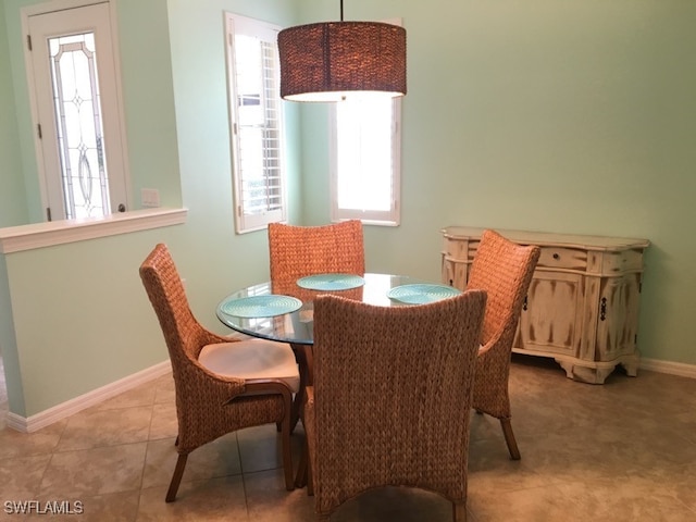 dining room featuring light tile patterned floors