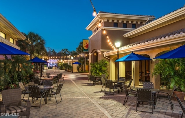 view of patio at twilight