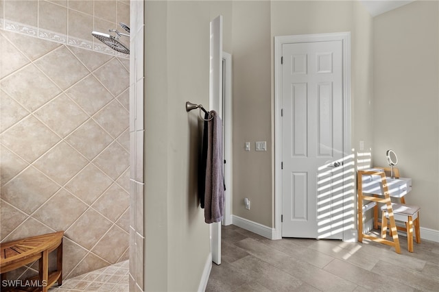 bathroom featuring tile patterned floors and walk in shower