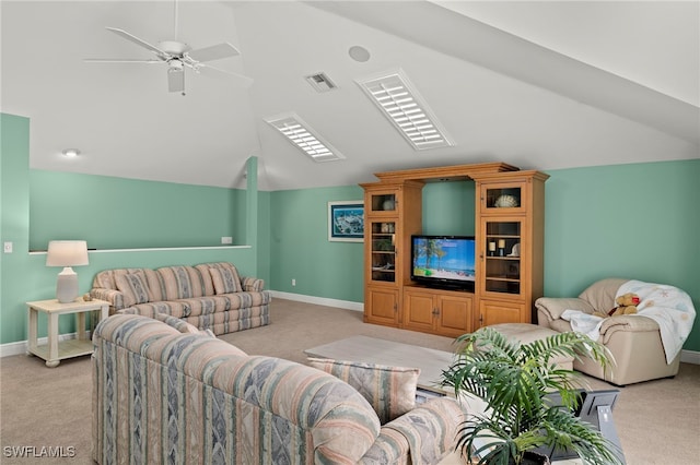 living room featuring ceiling fan, light carpet, and vaulted ceiling