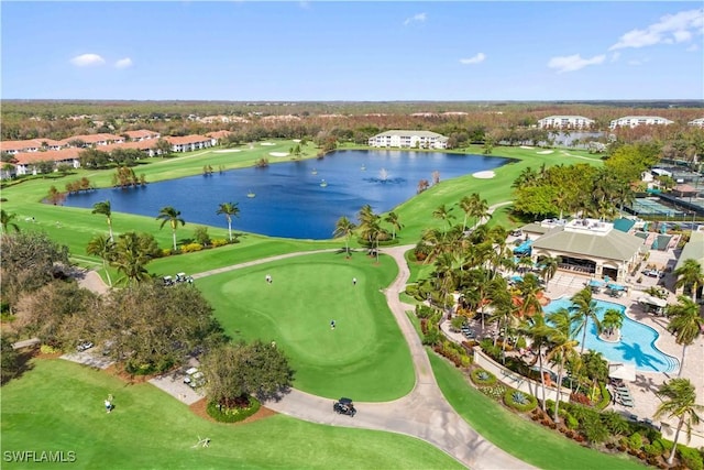 drone / aerial view featuring a water view and view of golf course