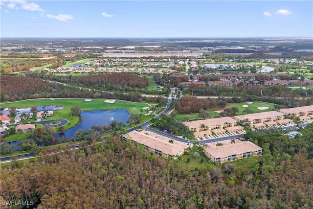 birds eye view of property featuring a water view and view of golf course