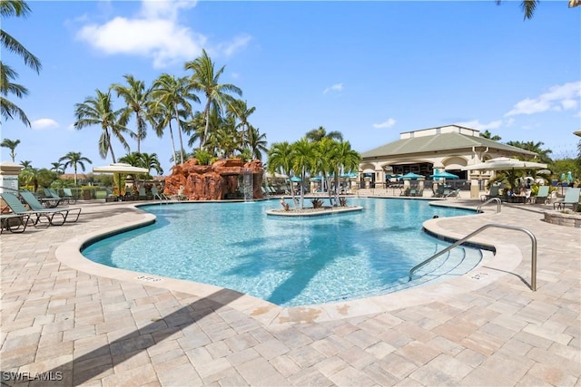 community pool featuring a patio area