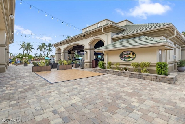 view of community with a patio