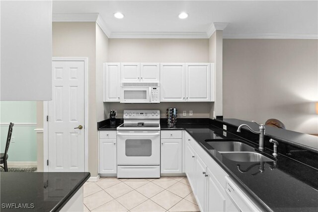 kitchen featuring ornamental molding, sink, light tile patterned flooring, white cabinets, and white appliances