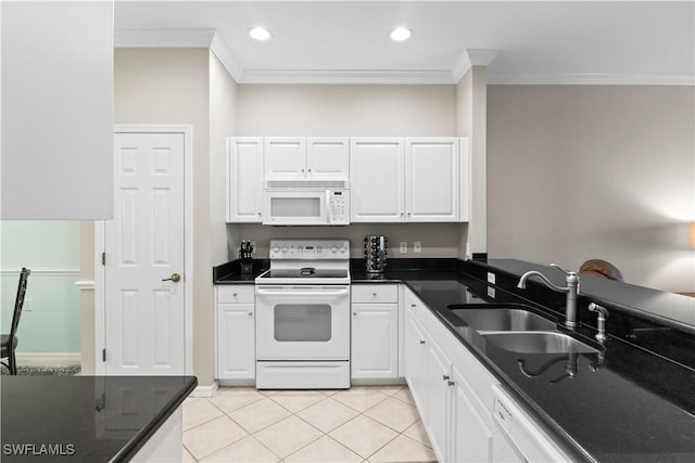 kitchen with white cabinetry, white appliances, light tile patterned floors, and a sink