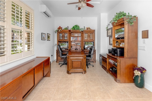 office space with light tile patterned floors, a wall mounted AC, and ceiling fan