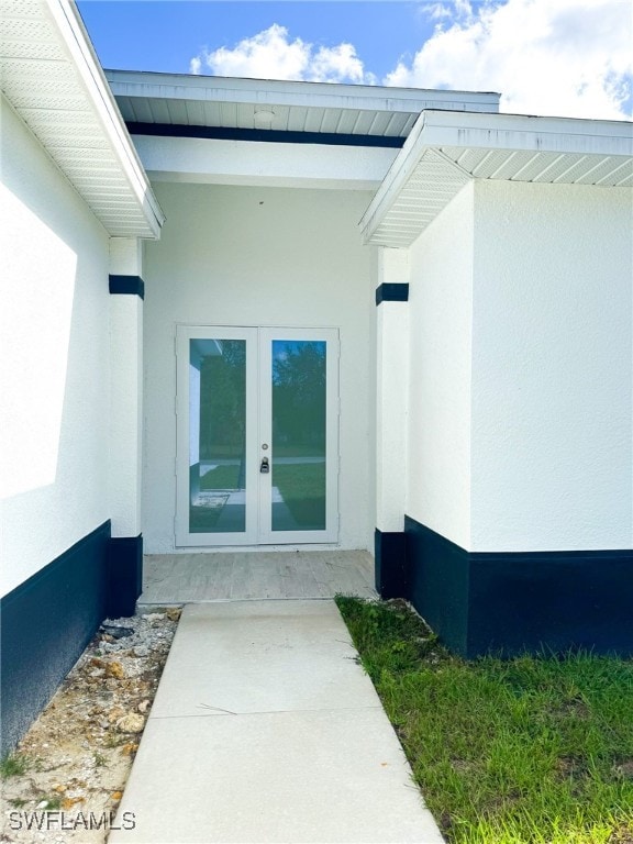 property entrance with french doors