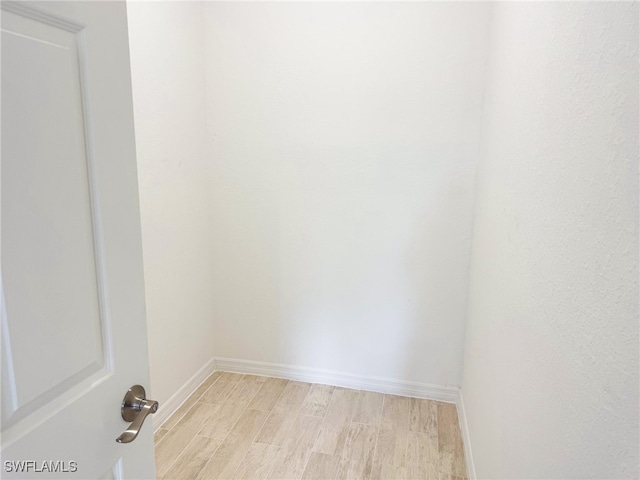 empty room with light wood-type flooring