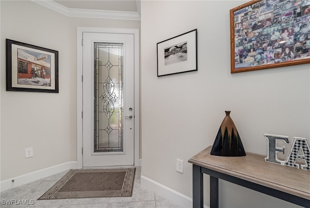 foyer featuring ornamental molding and light tile patterned flooring