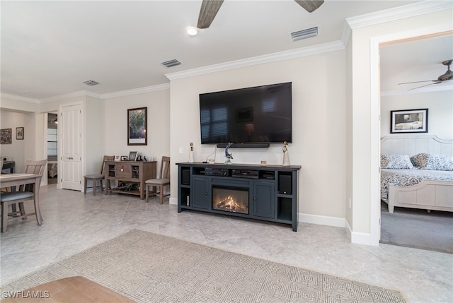 living room featuring ceiling fan and ornamental molding